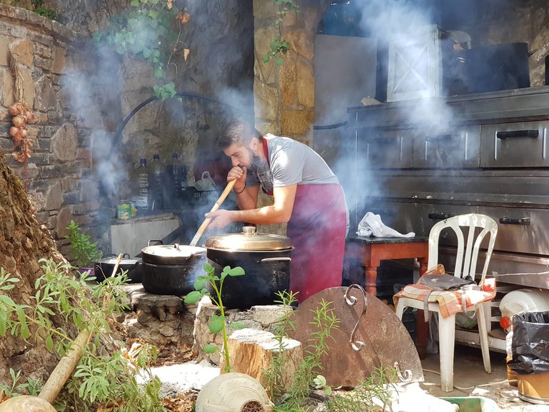 Chef Yianis cooking the traditional way