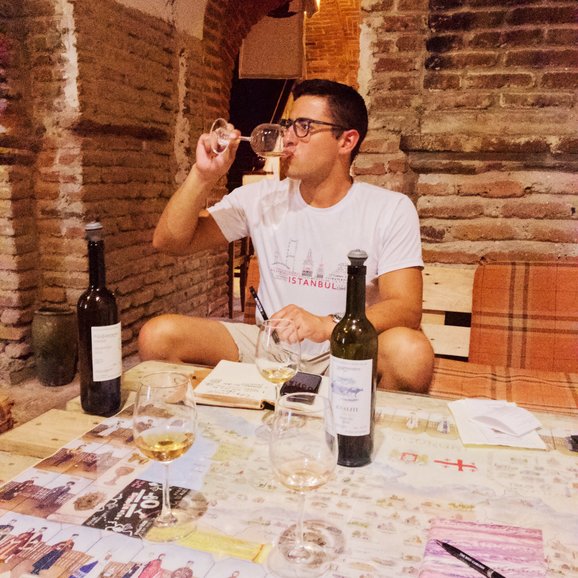 Facilitate Luxury co-founder Jacob enjoying wine at Vino Underground in Tbilisi