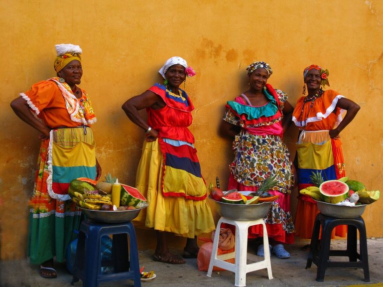 Palenqueras in their traditional, colorful dresses