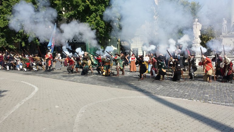 Participants parade in Bratislava's old town streets before the battle