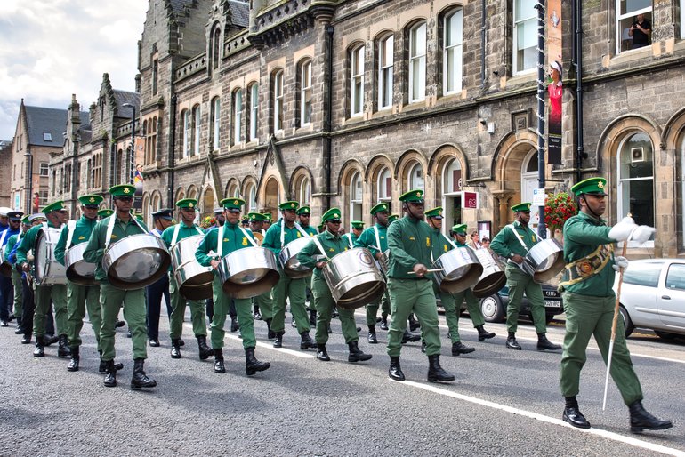 The Trinidad and Tobago Defence Force Steel Orchestra adds to the global atmosphere