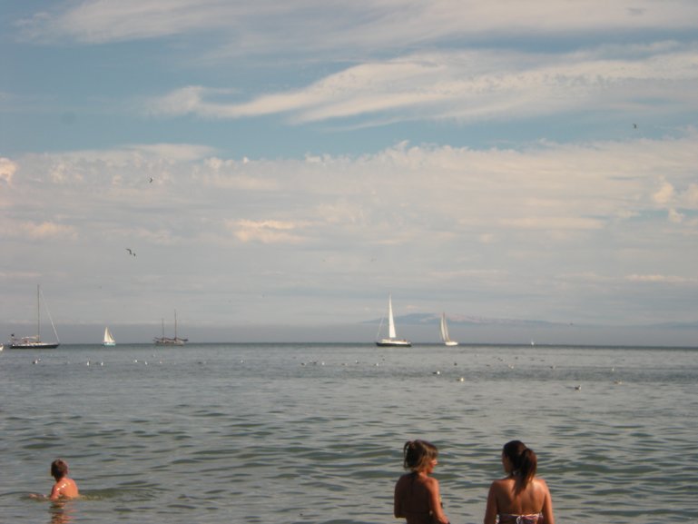 The beach at Capitola, CA with the mountains in the background.  (Image by A Wassenberg)