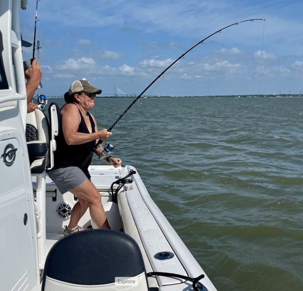 Kim catching a shark