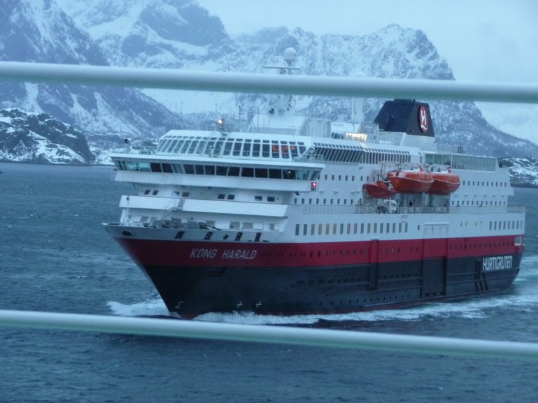 Passing a south bound  HURTIGRUTEN