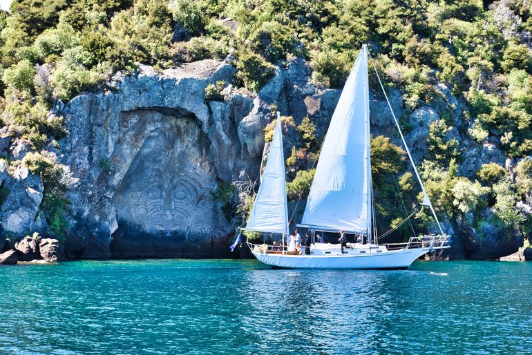 Sail Barbary and the Maori Carving in the cliff