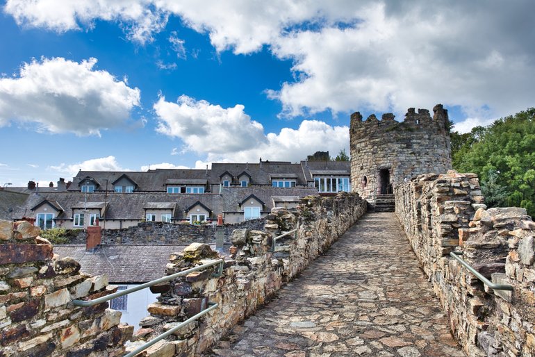 Uneven paths lead you around the outside of the town centre on the wall