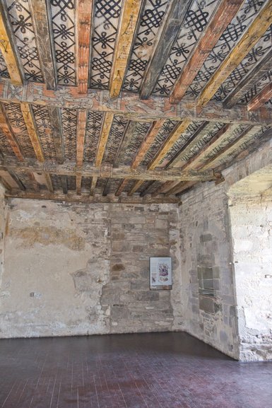 The painted ceiling on one of the first floor rooms