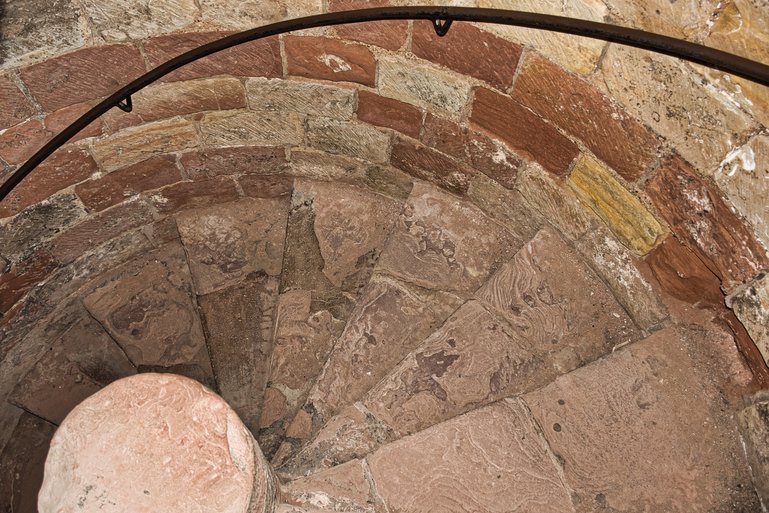 The typical spiral staircase that leads you up and down the floors