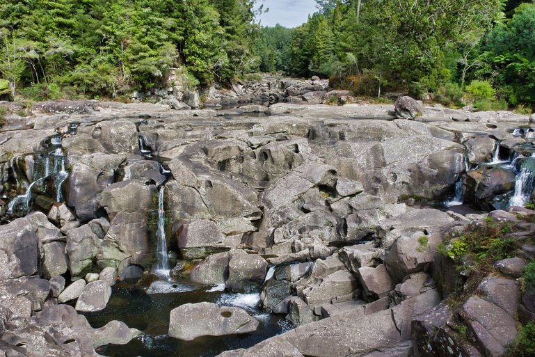 The first falls you may see are when you're driving over the bridge before entering the park.