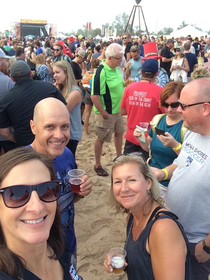 A Muskegon August tradition, beer on the beach.