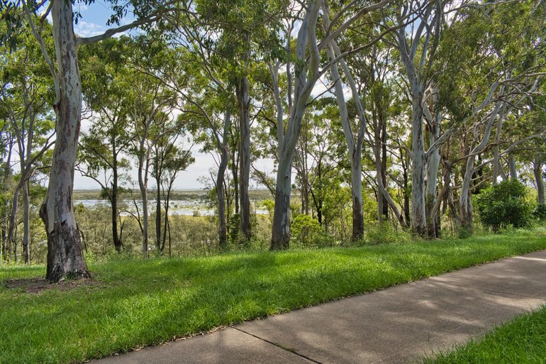 The pathway through Rothwell overlooking the wetlands and down at one of the many shelters along Deception Bay