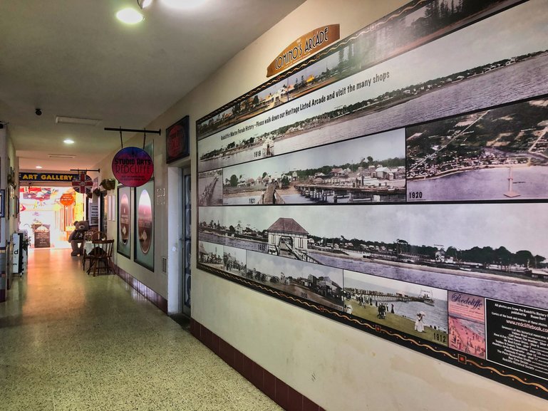 The Comino Arcade with historical photographs of early Redcliffe