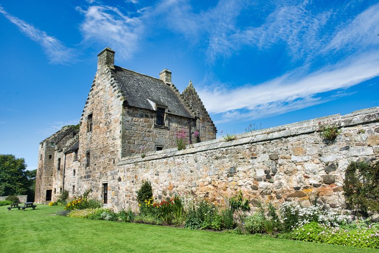 There are picnic tables at the rear of the Castle overlooking the gardens