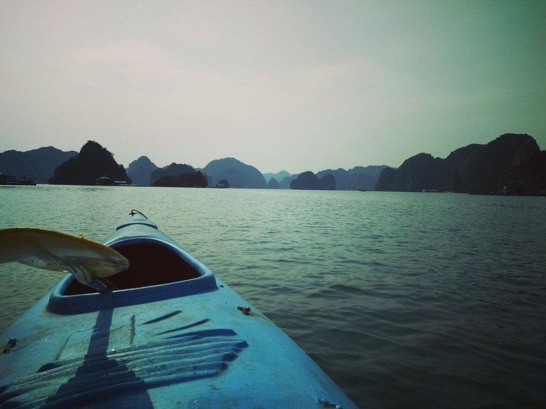 Kayakking through Halong Bay 