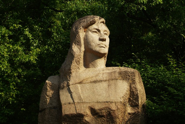 A sculpture made out of red sandstone