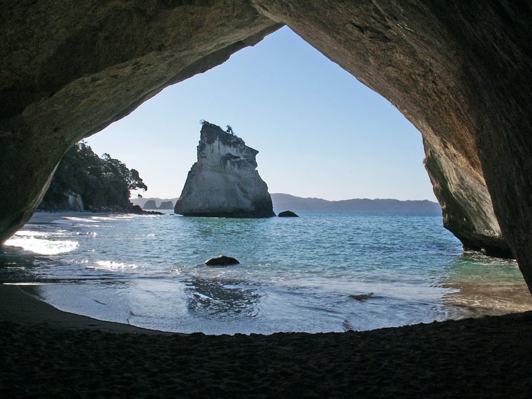 Through the cave to the other side of the beach.