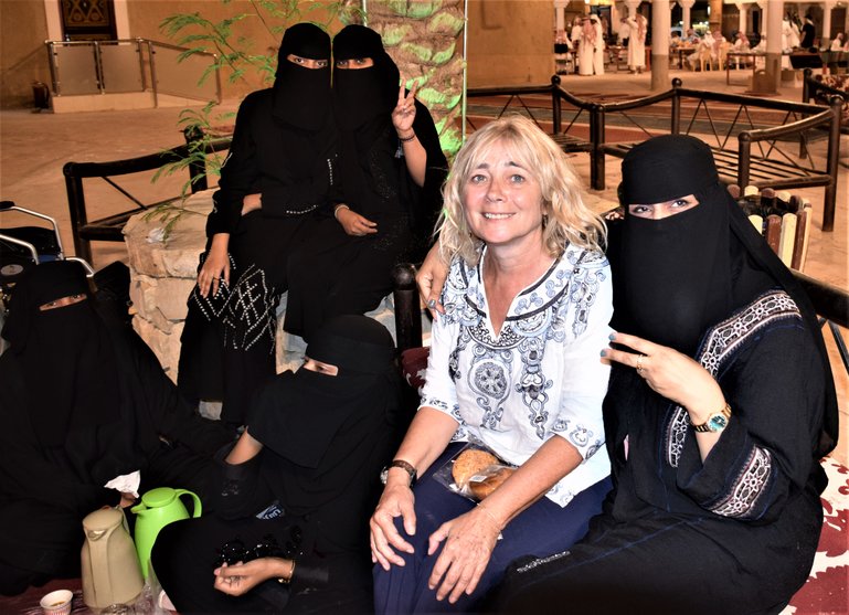 Sue taking coffee with the locals in the souq