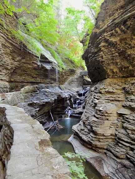 Trail and waterfall along the gorge path