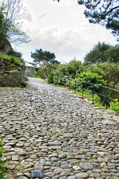 The rough, steep stone path leading to the entrance of the Castle