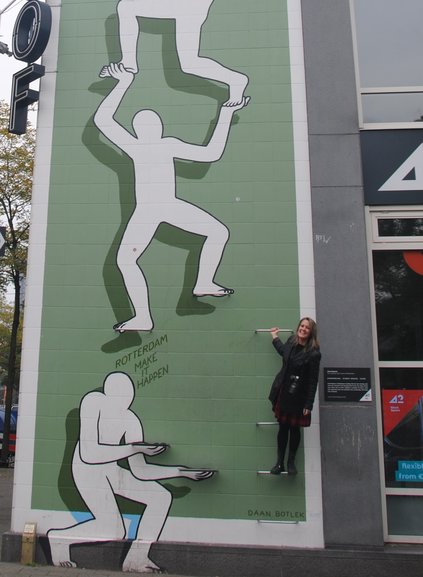 Here I am being a part of street art in this mural by Daan Botlek called On the Way to the Top.