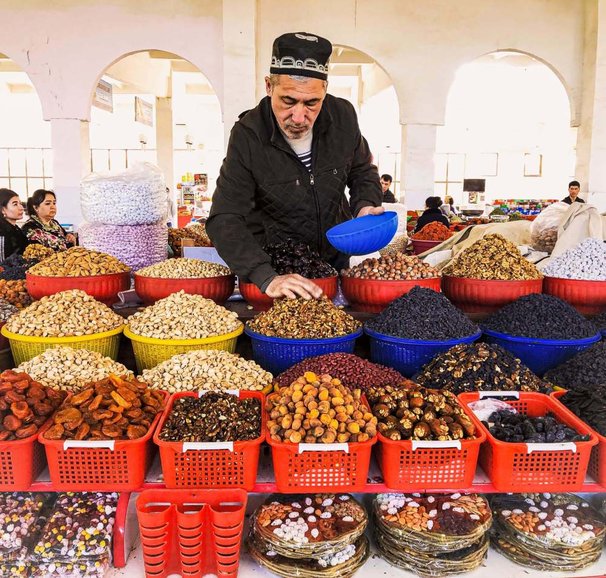 This kind fruit seller in Bukhara gave us some complimentary dry fruits to go with our purchase.