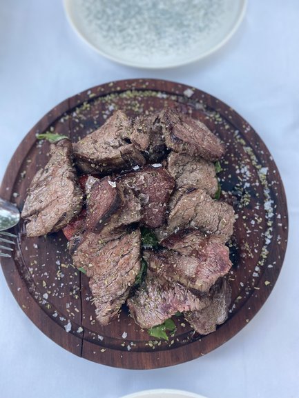 Plate of steak in one of Side's restaurants (Photo by SharedBucketList)