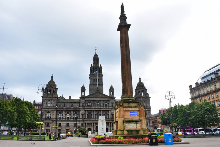 King George Square with the beautiful building of the City Chambers, Scott Monument and Glasgow Cenotaph