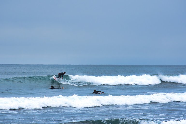 You can watch the surfers catch waves or try to.