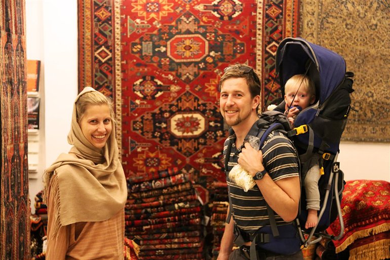 A young couple traveling to Iran with their chil