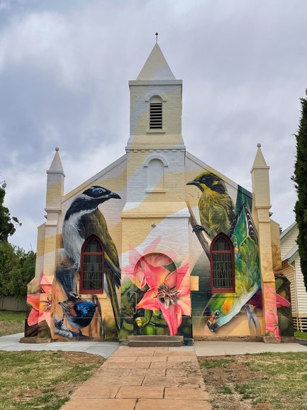 The front of the Wedderburn Church is covered in this nature shot.