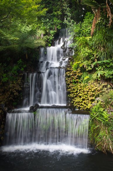 The waterfall has coloured lights during the Festival of Light.