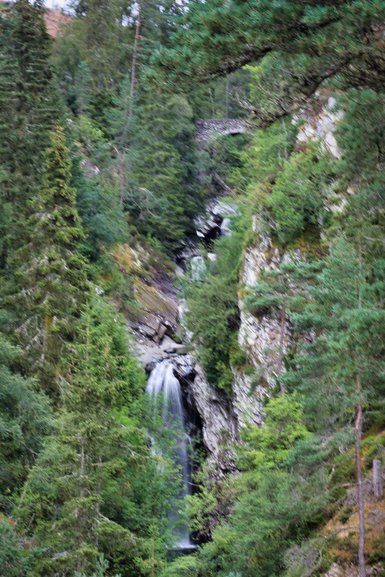 The view from partway up the path to Upper Falls. The bridge is at the top of the photo.