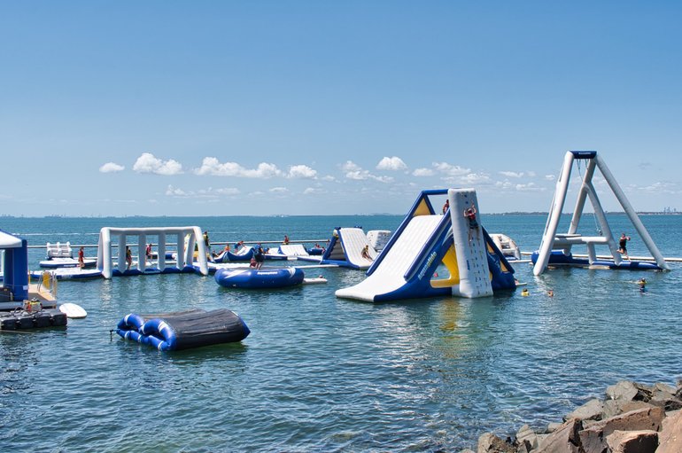 Kids of all ages having fun in the deep waters of Clontarf