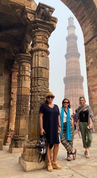 Girls enjoying the Qutub and other sights of Delhi city tour 