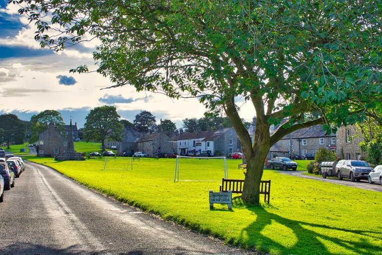 The Village of West Burton with parking on the left