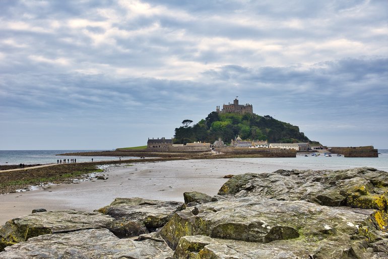 Mount St Michael from rocks on the coastline at Marazion