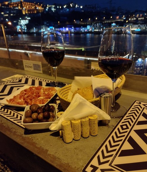 Wine and petiscos (small bites) along the Douro Riverfront at Wine Quay Bar. Photo by Paul Wilcox.