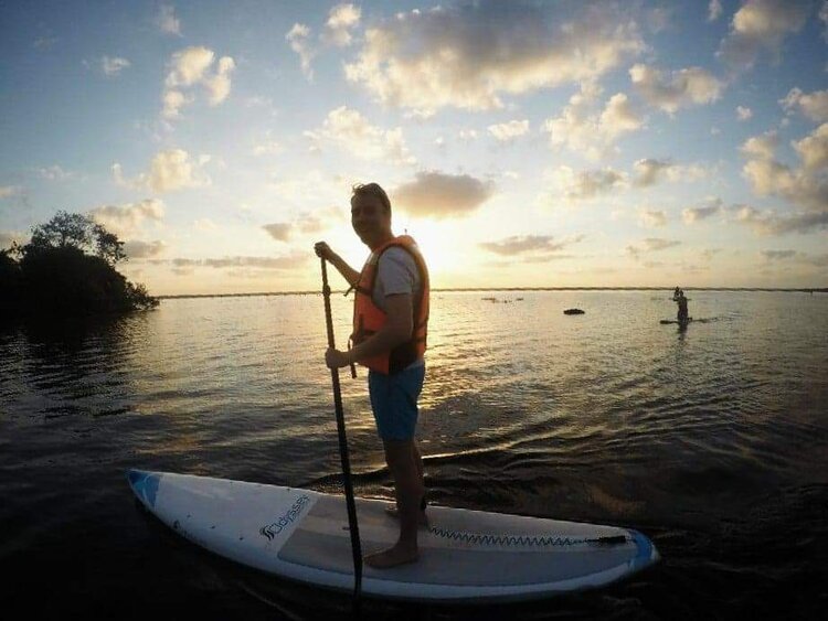 Steven paddleboarding at Bacalar 