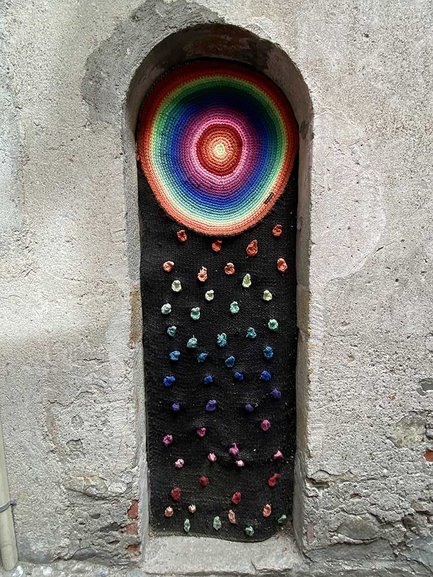 Painting door in Maccagno