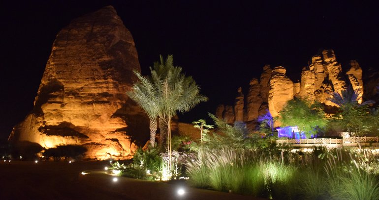 Illuminated rock formations at Shaden Desert Resort
