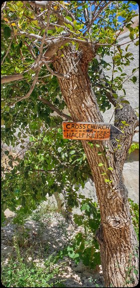 Signage along the track to the Church with the Cross