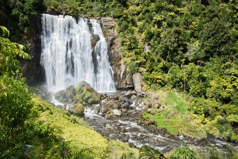 The falls which greet you at the bottom of the stairs